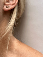 Close-up of the model showing the 4mm and 3mm heart studs in her ears