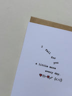 Greeting card reading “I fall for you a little more every day,” featuring a symbolic equation inspired by the continuous growth model, with the words “I fall for you” arranged to appear as if they’re gently falling.
