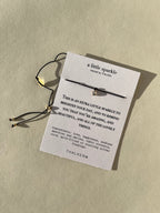Thalken® sparkle mantra bracelet displayed on a bracelet card with the written intention and meaning