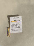 Bracelet displayed on a Thalken® card with the printed mantra/intention