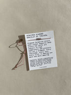 Herkimer diamond bracelet displayed on mantra bracelet card against a neutral backdrop