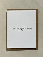 Minimalist Thalken greeting card with “I still love getting to know you” on the front cover, displayed with envelope, A2 size