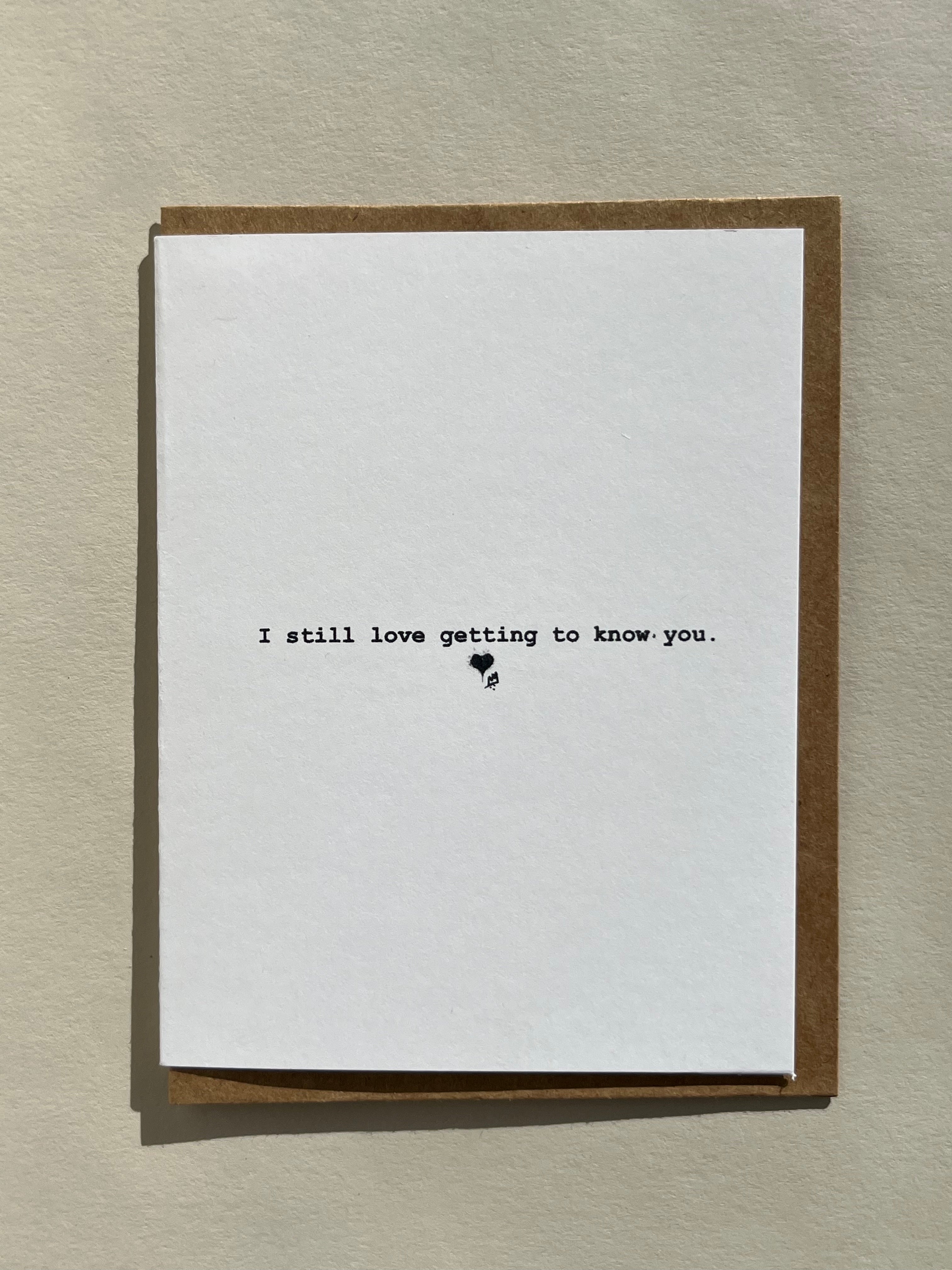 Minimalist Thalken greeting card with “I still love getting to know you” on the front cover, displayed with envelope, A2 size